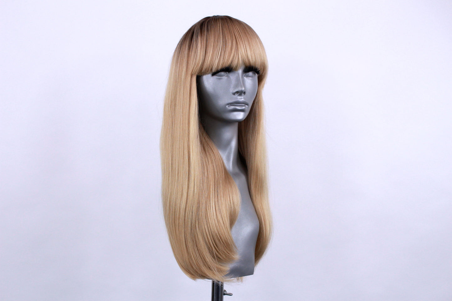 Regina- Rooted Champagne Blonde