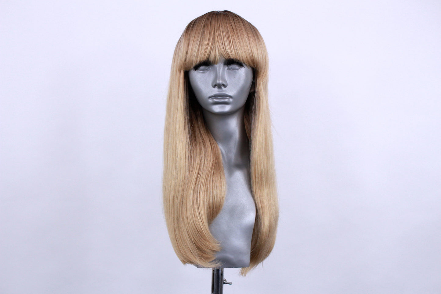 Regina- Rooted Champagne Blonde